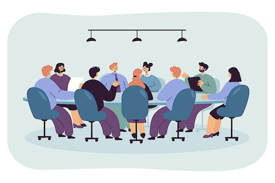 Politician sitting at round table in boardroom